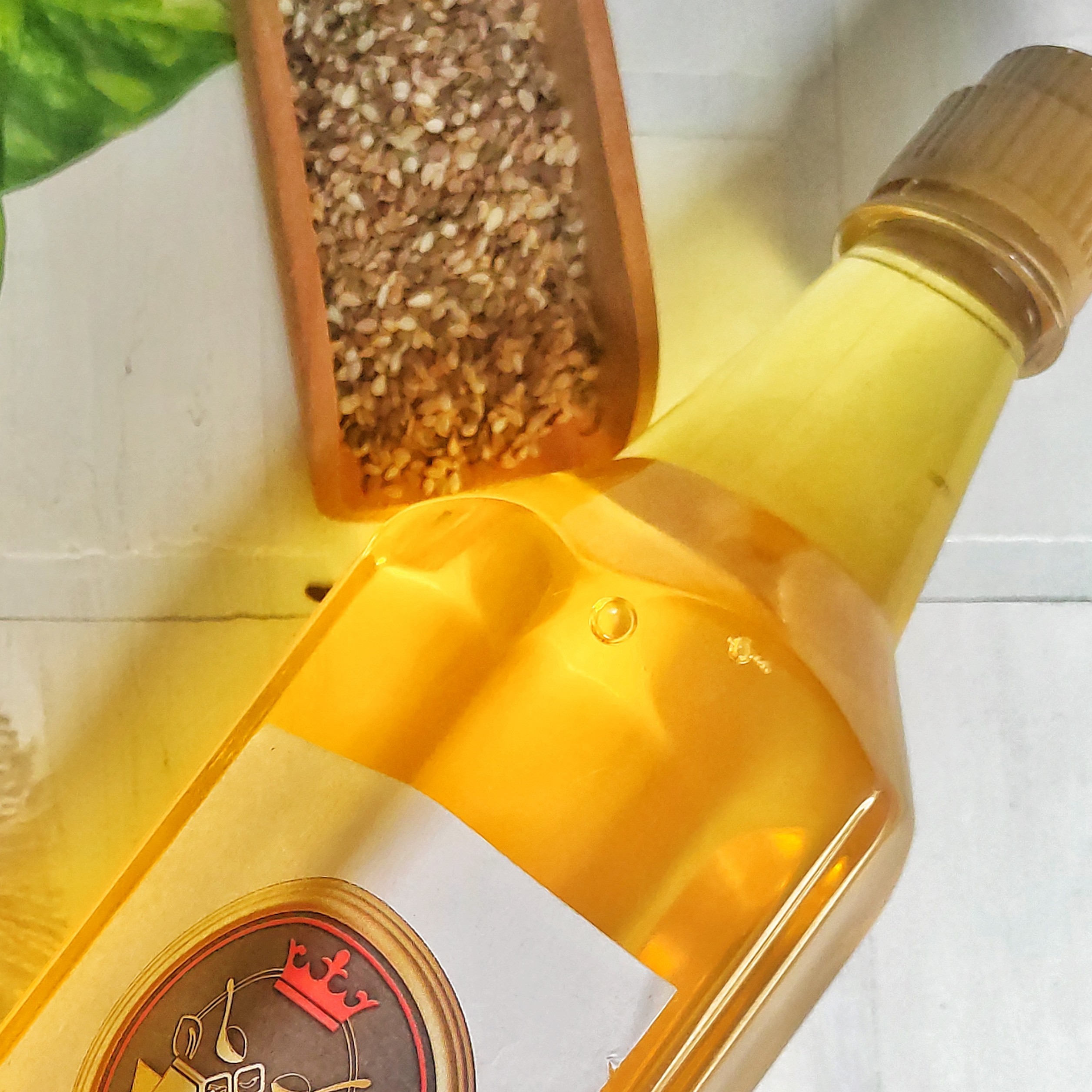 روغن ارده کنجد ایرانی تازه یک لیتری داهمان با نشان کیفیت (درب آرام ریز)