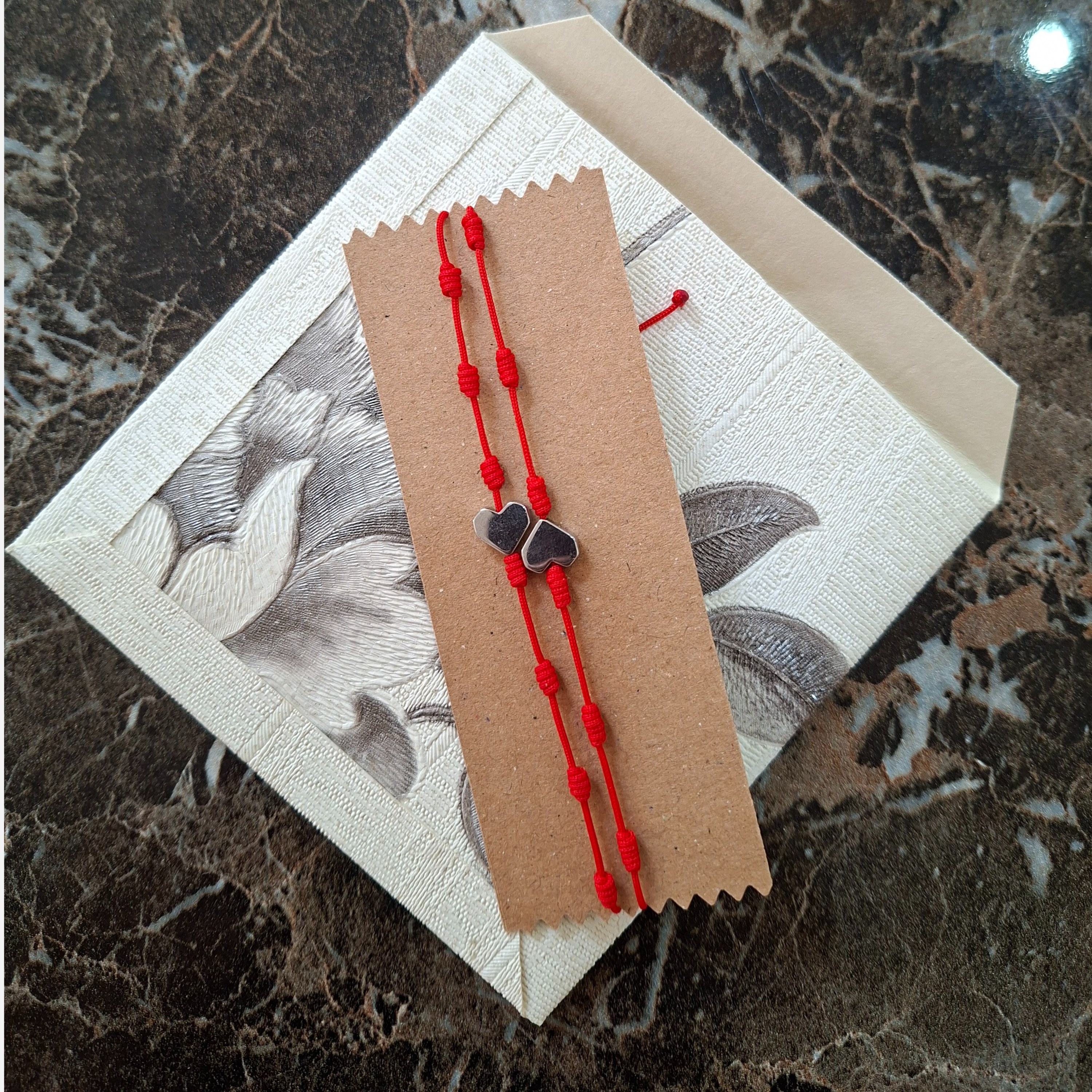 دستبند هفت گره دستبند رد استرینگ faezecraft