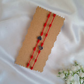دستبند هفت گره دستبند رد استرینگ faezecraft